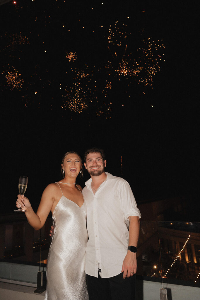 bride and groom photos under the fireworks