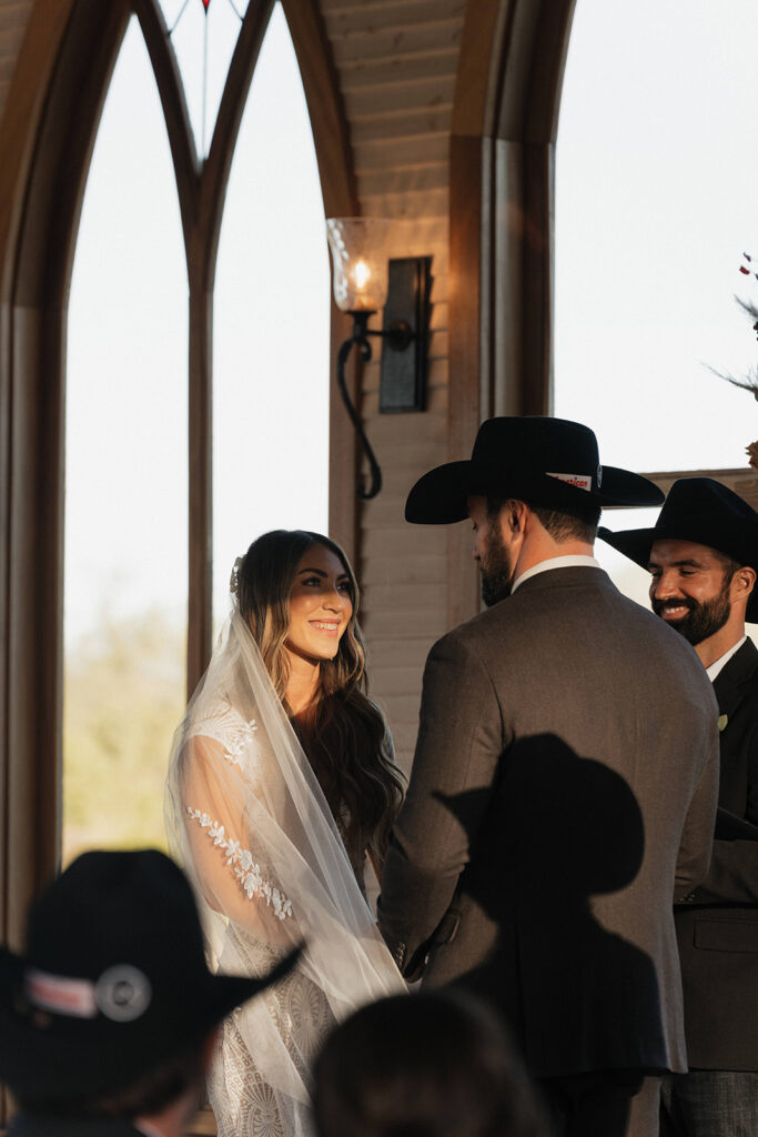 bride and groom exchanging vows in a classy western wedding ceremony.